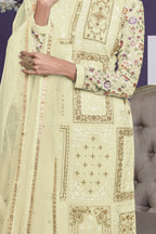 Cream Georgette Kameez With Pant For Ladies Indian Festivals & Weddings - Thread Embroidery Work, Zari Work - hem and footwear detail