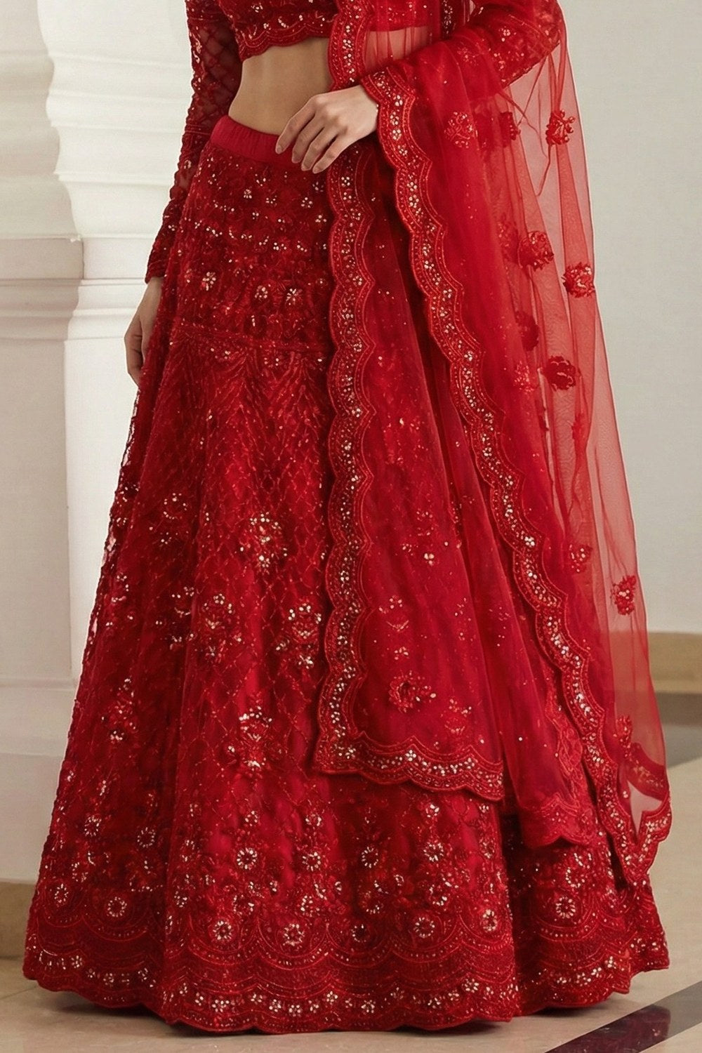 Red Sangeet Lehenga Choli in Net with Sequins & Thread Embroidery - hem and footwear detail