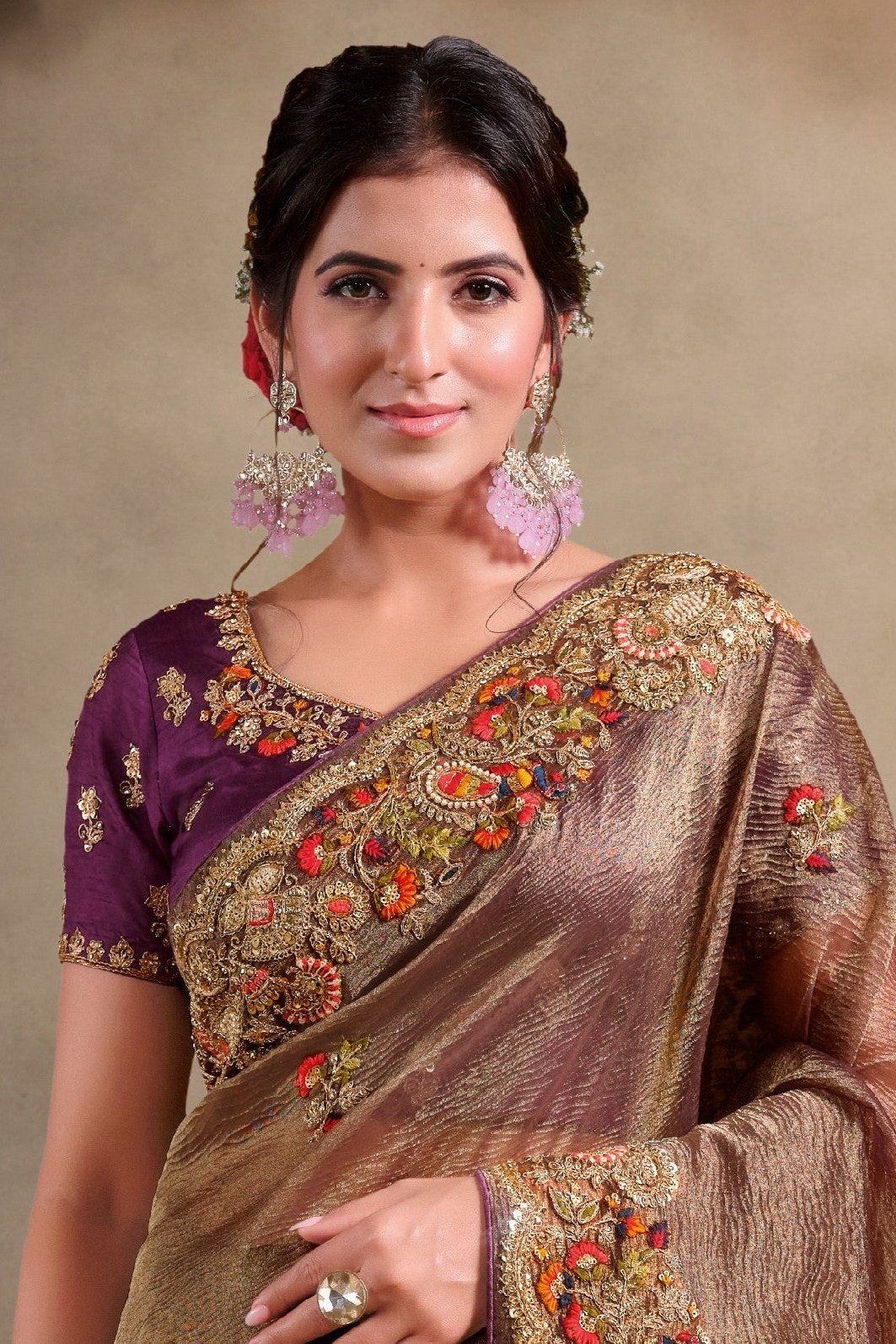 Brown embroidered saree with khatli and sequin embroidery, front view showing the embellished blouse and detailed border
