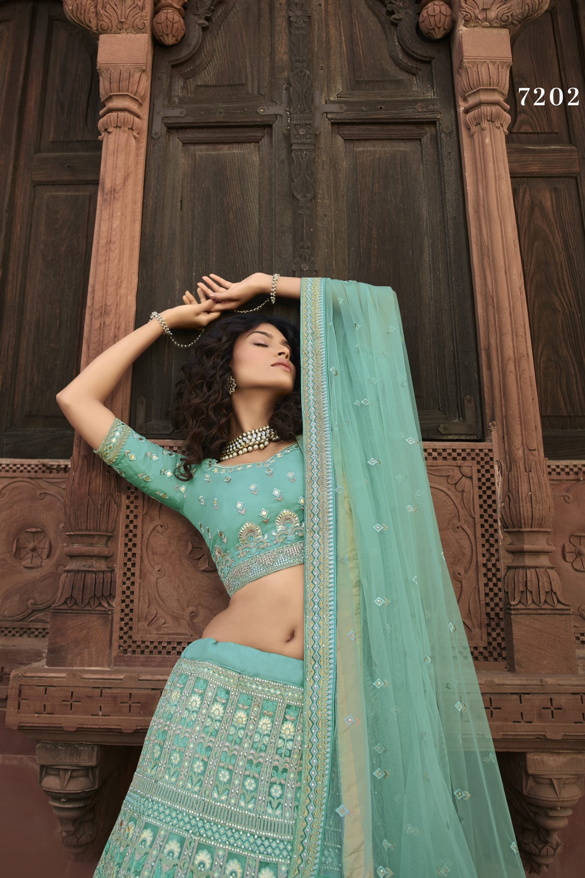 Turquoise Pakistani Organza Lehenga Choli For Indian Festivals & Weddings - Sequence Embroidery Work, Resham Embroidery Work, Zari Work, Dori Work, Zarkan Work